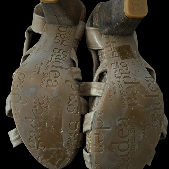 Tan sandals with open-toe design and intricate strap pattern - Picture 4 of 4